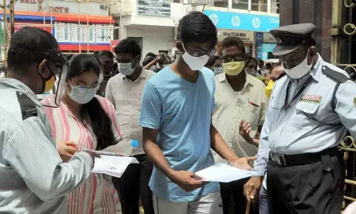 NEET candidates at an examination centre in Vijayawada on Sunday
