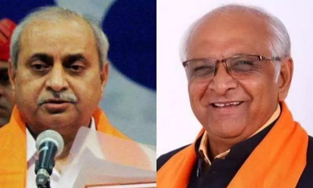 Gujarat Deputy Chief Minister Nitin Patel  and CM-designate Bhupendra Patel