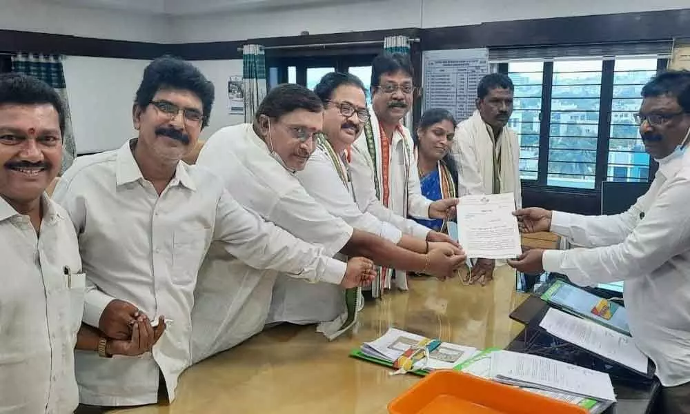 Congress party leaders submitting a memorandum to APEPDCL CMD K Santhosha Rao in Visakhapatnam on Monday