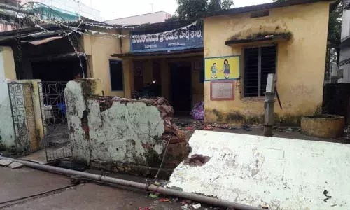 A view of a dilapidated compound wall at MPP School, Simhagiri Colony in Gajuwaka