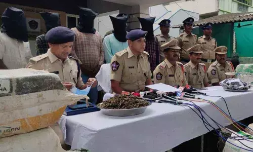 Police giving details of the case to the media in Eluru on Monday