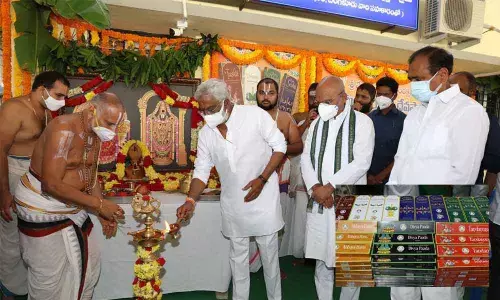 TTD Chairman YV Subba Reddy lighting a traditional lamp to mark the launch of Agarbathi sale at a function at TTD Goshala in Tirupati on Monday; The seven brands of Agarbathis released by the TTD(Inset Pic)