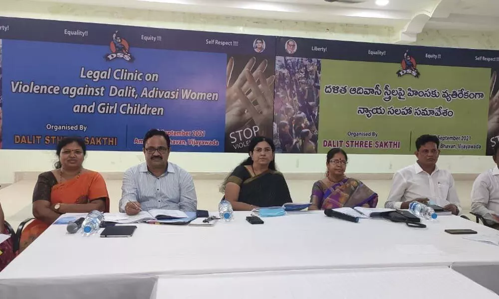 Principal Secretary of Social Welfare department Anuradha, Joint Director of Prosecutions Subbalakshmi, DSS national convener Geeddam Jhansi, Director of Social Welfare Raghuram participating in the legal clinic organised by Dalit Sthree Sakthi in Vijayawada on Tuesday