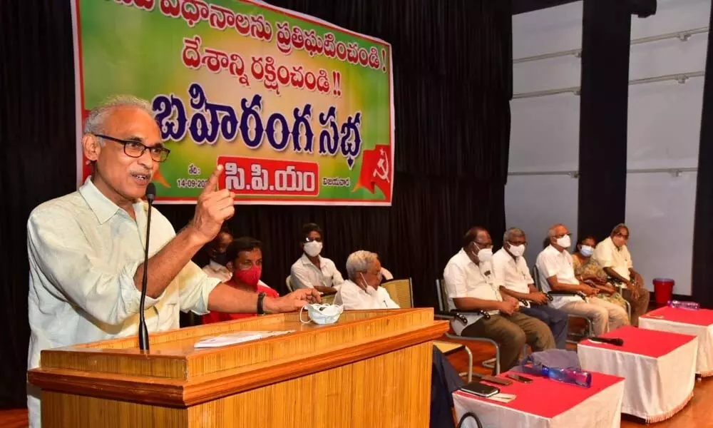 CPM Politburo Member BV Raghavulu addressing a public gathering in Vijayawada on Tuesday