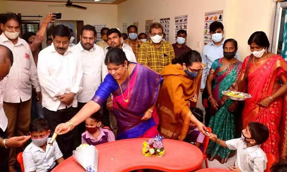 GVMC Mayor G Hari Venkata Kumari and Municipal Commissioner G Srijana with the kids at the day care centre in Visakhapatnam