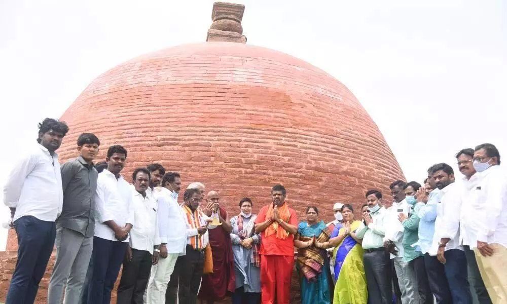 Tourism Minister M Srinivasa Rao and other officials at the inaugural of the reconstructed mahastupa at Thotlakonda hills in Visakhapatnam on Tuesday