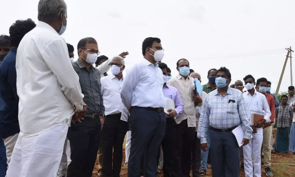 Nellore Collector KVN Chakradhar Babu visiting house sites at Budamgunta in Kavali mandal on Tuesday