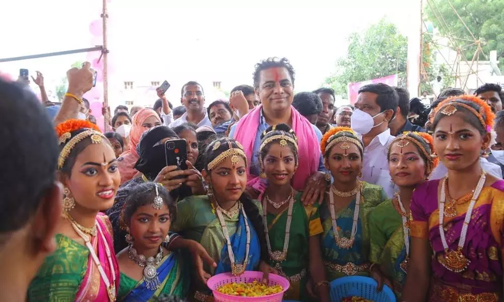 Min KTR poses with Kasturiba students in Gadwal on Tuesday