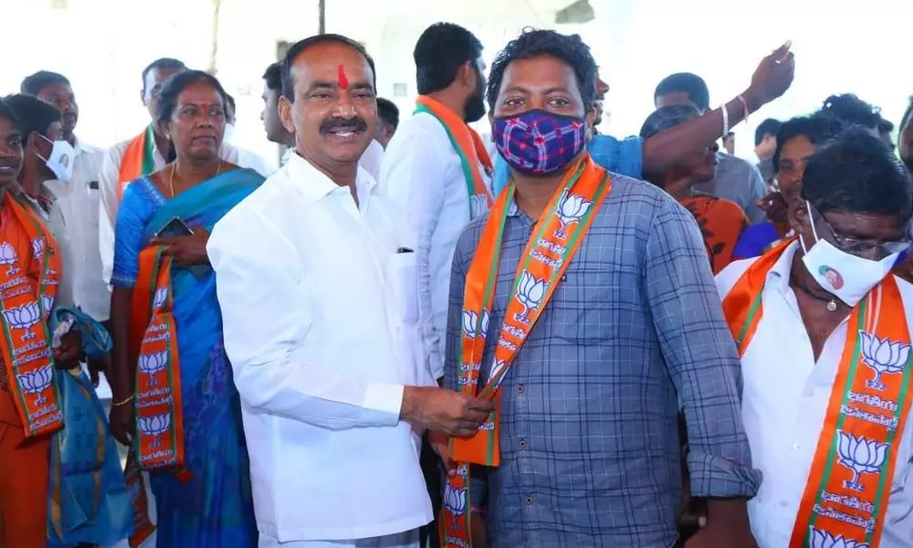 Several leaders from the Gouda community joining the BJP in the presence of Eatala Rajender in Ghanmukhla village in Karimnagar district on Wednesday