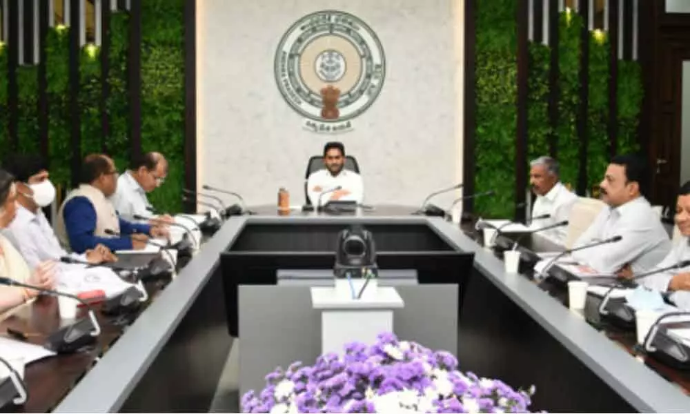 Chief Minister Y S Jagan Mohan Reddy reviews YSR Cheyutha and Aasara welfare schemes at his camp office in Tadepalli on Wednesday