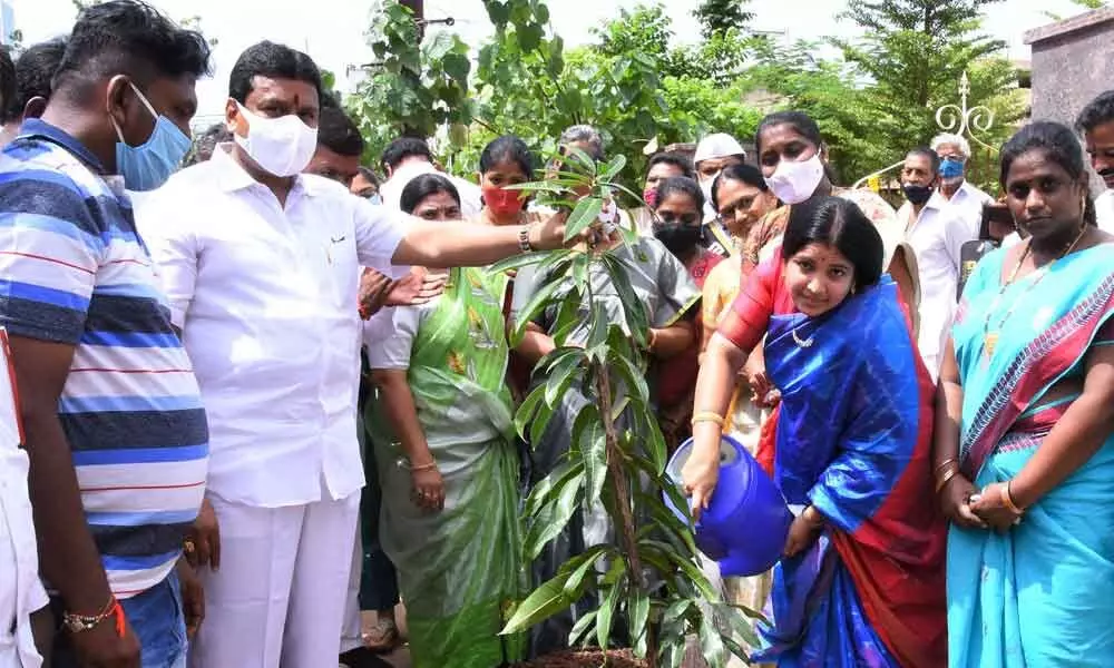Endowments Minister Velampalli Srinivas, Mayor R Bhagyalakshmi, Municipal Commissioner Prasanna Venkatesh during the inauguration of a renovated park in Vijayawada on Wednesday