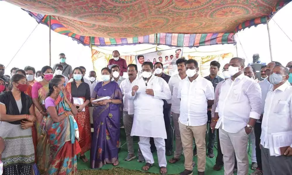 Minister for Housing Cherakuvada Sri Ranganadha Raju and Home Minister Mekathoti Sucharita visiting YSR Jagananna Colony at Perecherla on Wednesday