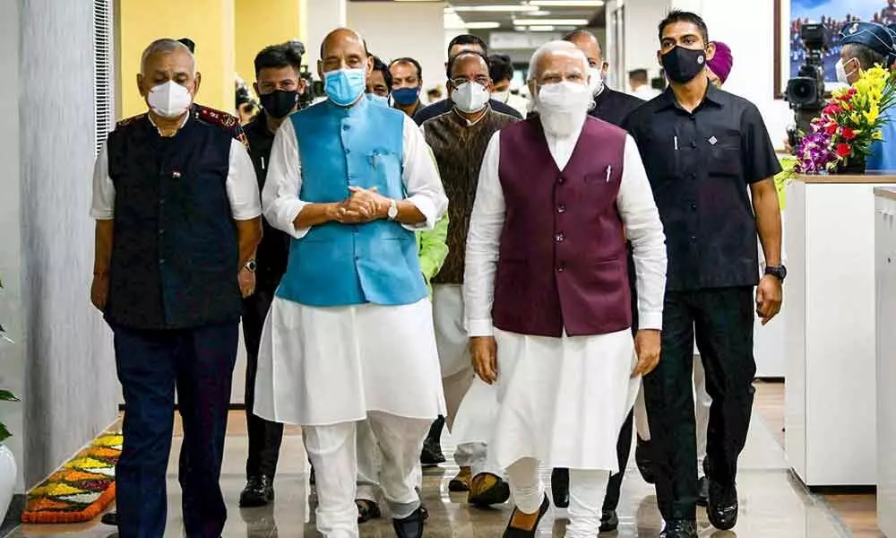 Prime Minister Narendra Modi during the inauguration of the Defence Offices Complex, in New Delhi on Thursday. Union Minister for Defence Rajnath Singh and other dignitaries are also seen