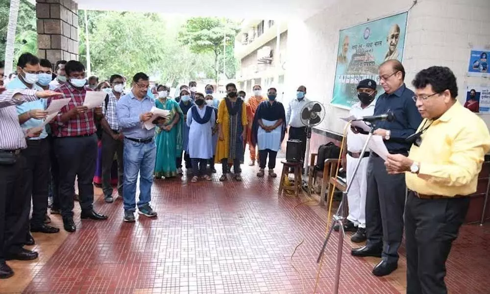 DRM Anup Kumar Satpathy administering Swachhta pledge to the officers at his office in Visakhapatnam on Thursday