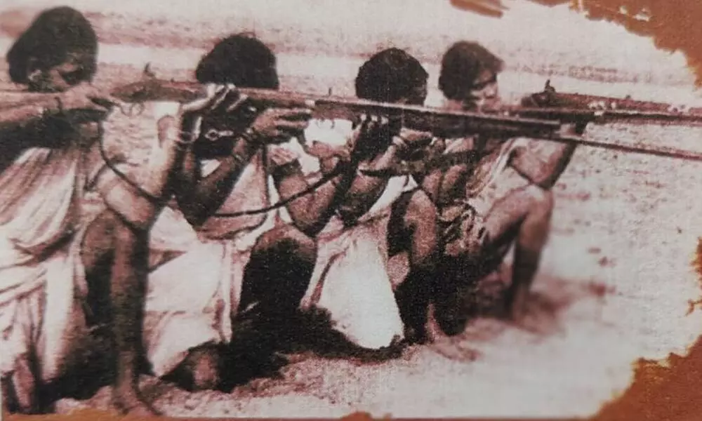 Firing action photo of Mallu Swarajyam and other comrades