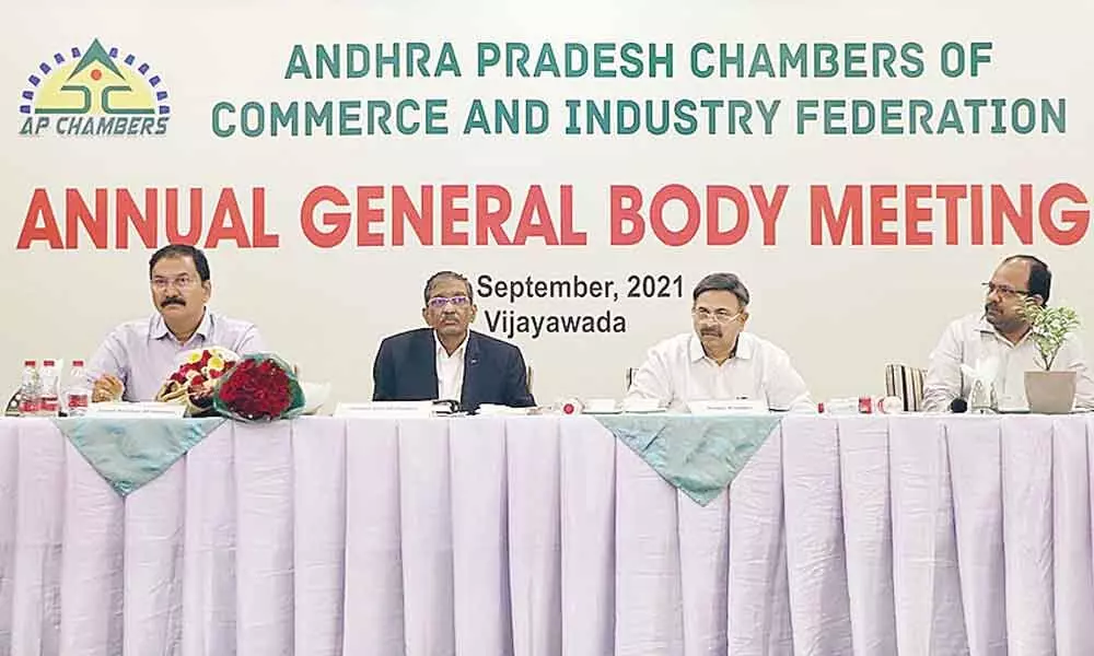 AP chambers executive members addressing the gathering at the general body meeting in Vijayawada on Saturday