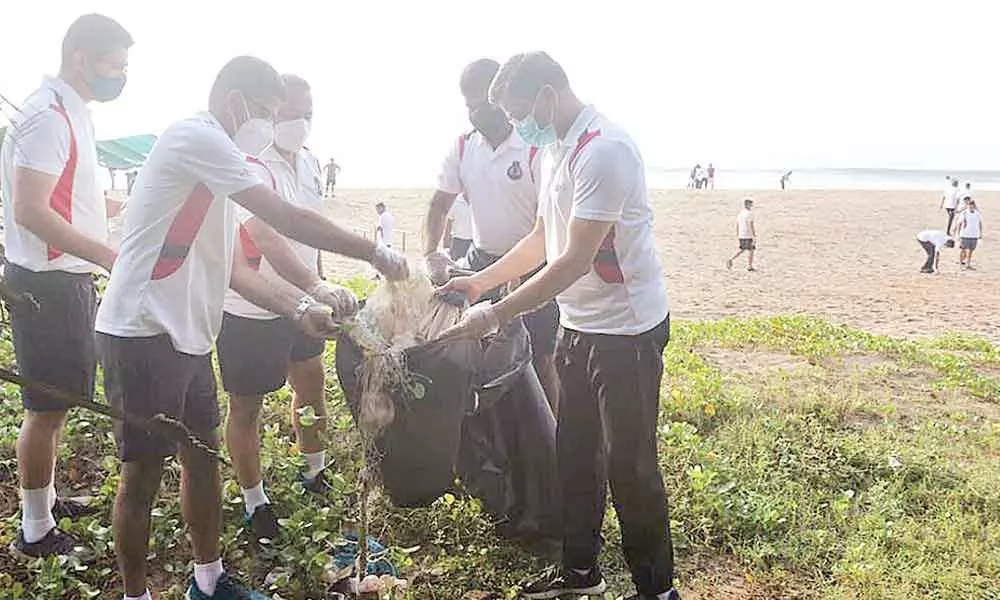 Naval personnel taking part in the 36th International Coastal Cleanup Day organised by the Eastern Naval Command (ENC) in Visakhapatnam on Saturday