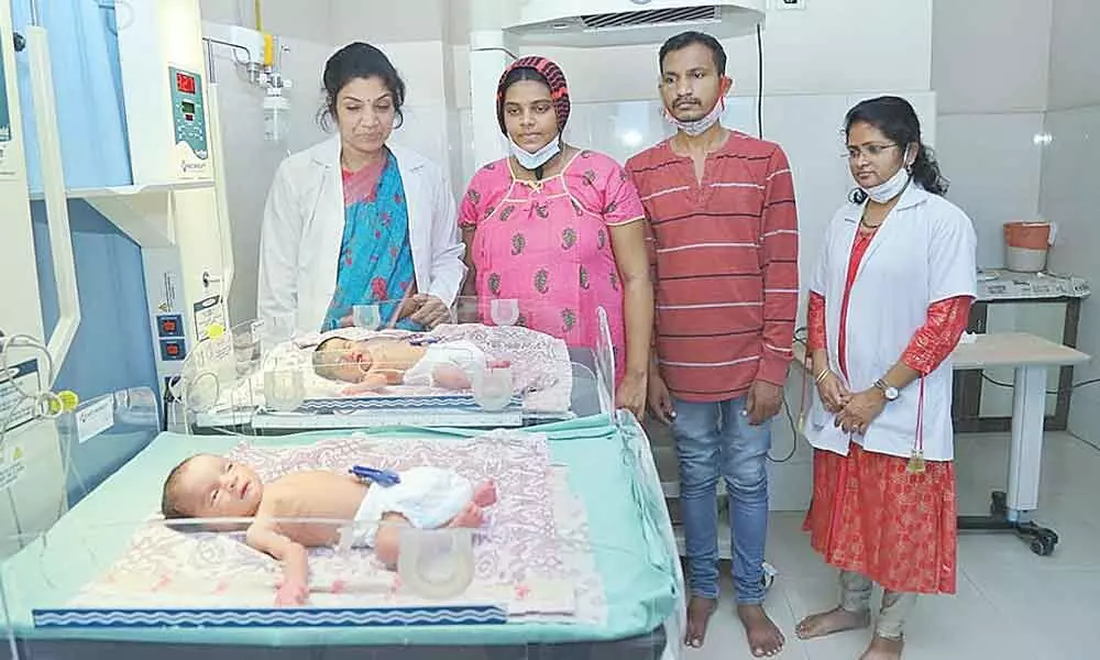 T Bhagyalakshmi with her twin daughters at a private hospital in Visakhapatnam