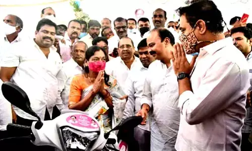 KTR distributes three-wheeler vehicles under Gift A Smile