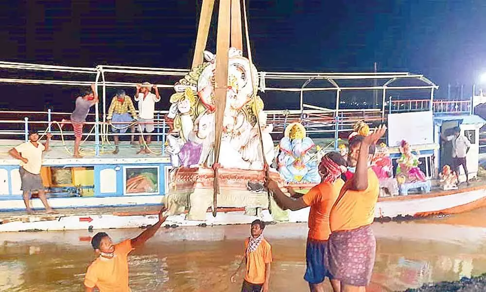 Ganesh idols immersion programme at River Godavari in Bhadrachalam on Sunday.