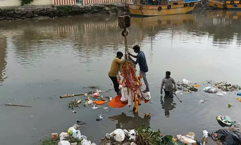 A Ganesh idol being immersed in Kakinada on Sunday