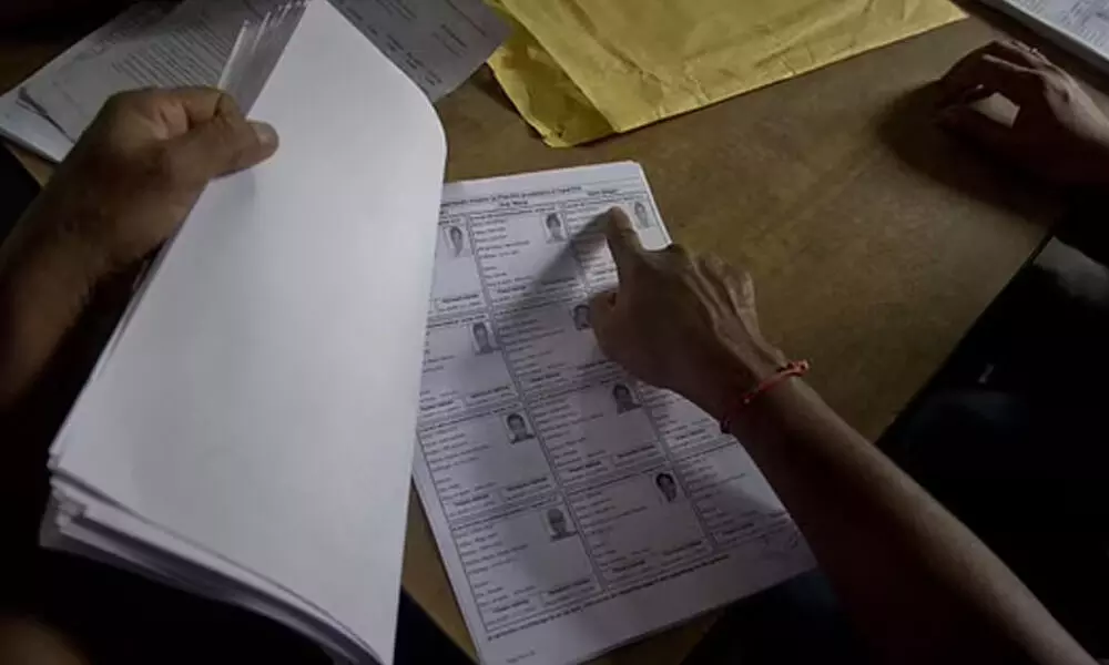 People check their names in the final list of the National Register of Citizens (NRC) at an NRC center in Assam. (File Photo | AP)