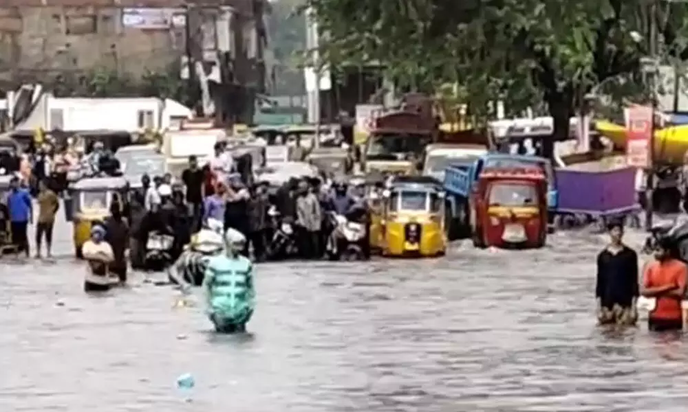 Sudden downpour sends parts of city into a tizzy