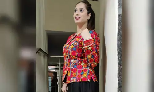 Decorating a cloth with needle work