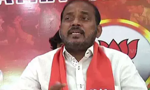 BJP state secretary Madagoni Srinivas Goud