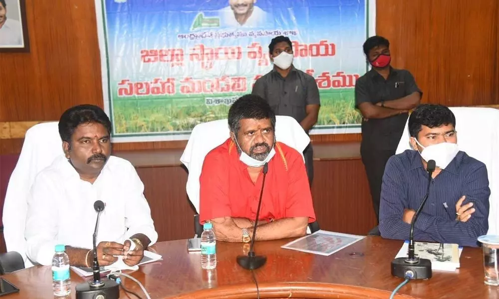 Tourism Minister M Srinivasa Rao speaking at the review meeting held in Visakhapatnam on Tuesday