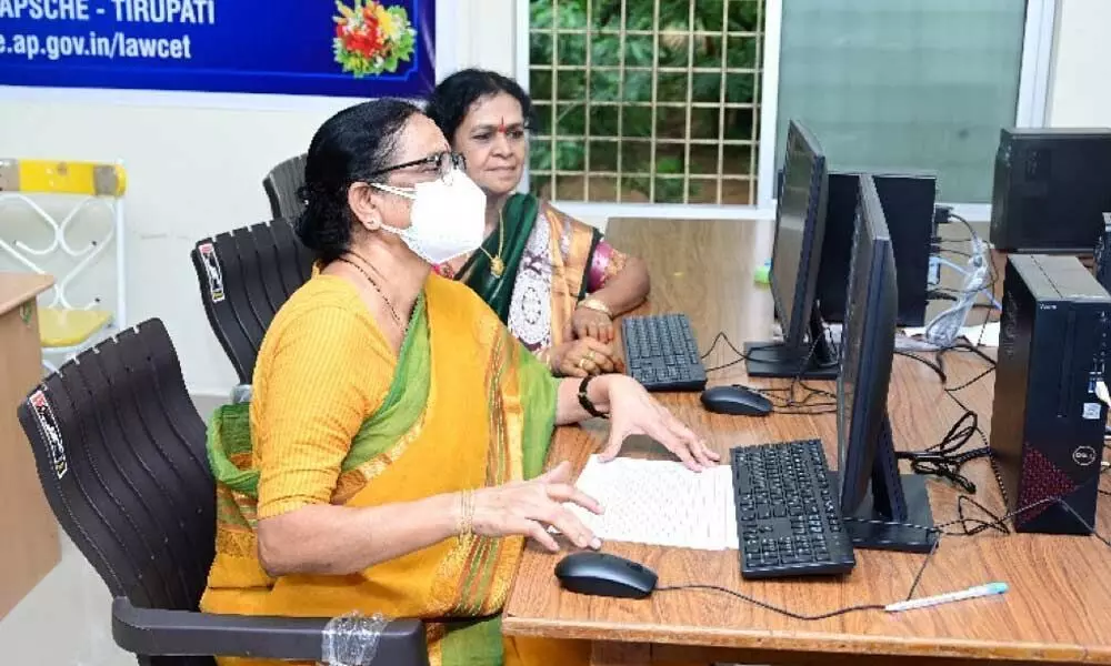 Vice-Chancellor of SPMVV Prof D Jamuna and convenor Prof NB Chandrakala monitoring the conduct of LAWCET in Tirupati on Wednesday