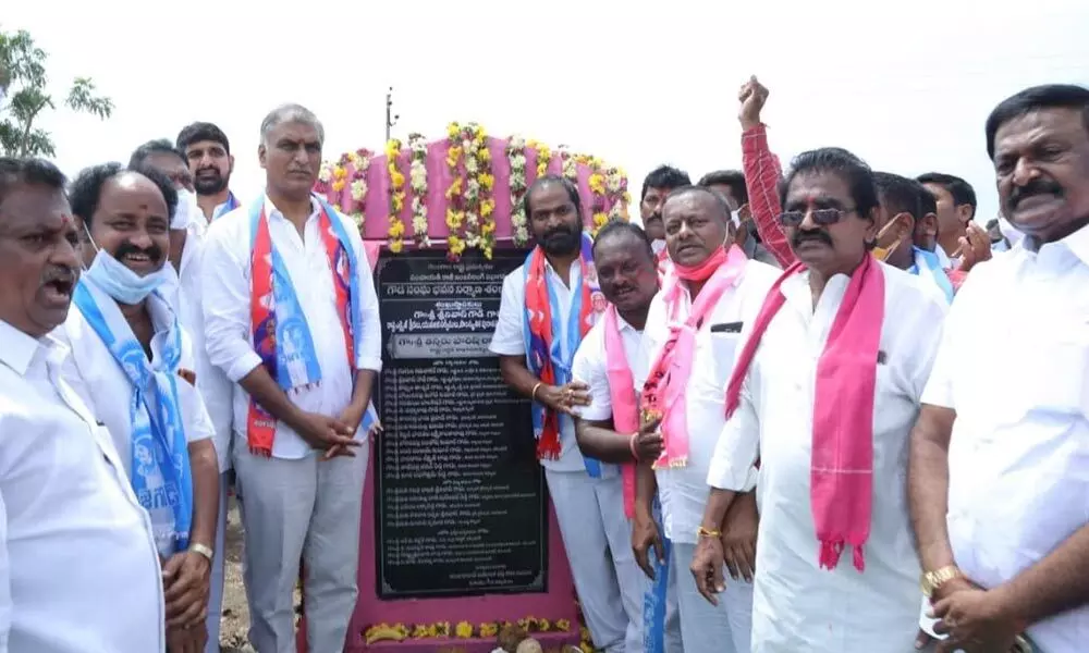 Ministers T Harish Rao, Srinivas Goud and others during the foundation stone laying for the Gouda Community Hall in Huzurabad on Wednesday