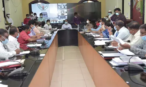 District Collector Vivek Yadav addressing a meeting in Guntur on Wednesday. Joint Collectors AS Dinesh Kumar, G Rajakumari, Anupama Anjali and K Sridhar Reddy also seen