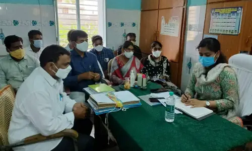 Nandyal Sub-Collector Chahat Bajpai speaking at an awareness meeting on land conversion in Kurnool on Thursday