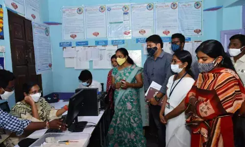 District Collector Nagalakshmi Selvarajan inspecting a village secretariat in Kandukur village on Thursday