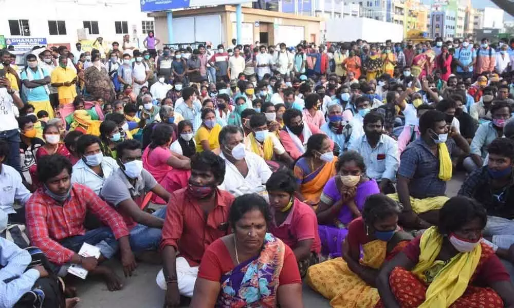 Pilgrims protesting at Srinivas pilgrim complex in Tirupati on Friday after TTD stopped issuing of SSD free darshan tokens