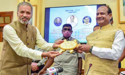 Lok Sabha Speaker Om Birla being presented a memento by Assembly Speaker Vishweshwar Hegde Kageri after a press conference at Vidhana Soudha in Bengaluru
