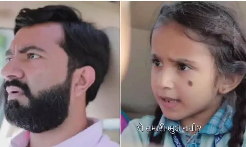 Little girl scolds dad for breaking traffic rules in viral video posted by Surat Police.