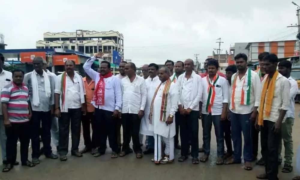 Leaders of Left and Congress party staging a protest in Jukkal on Monday