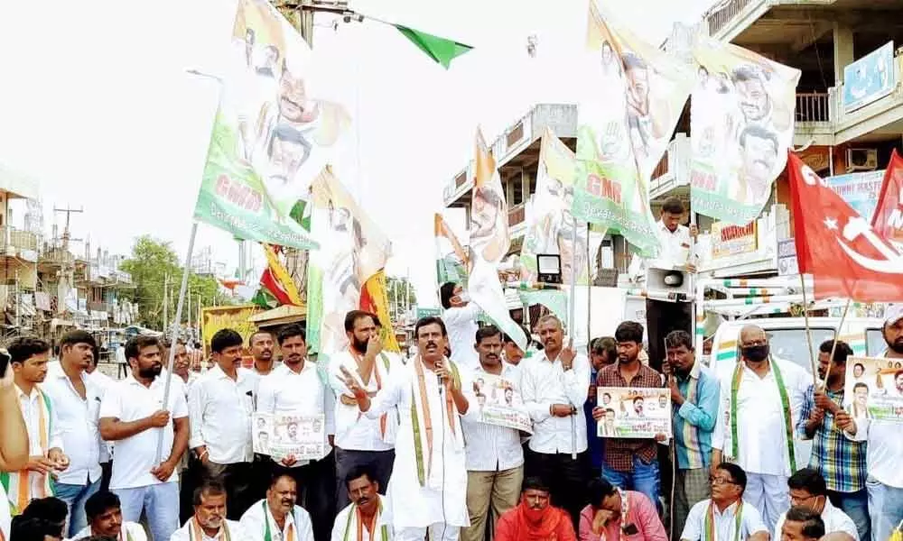 Devarkadra constituency in-charge G Madhusudhan Reddy speaking at a protest programme in Kothakota on Monday