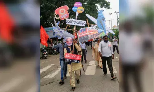 A demonstration India for Sale by Arunodaya artists in Ongole as part of the protest rally on Bharat Bandh on Monday