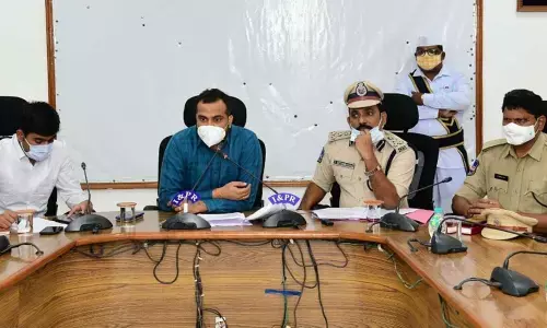 Collector RV Karnan addressing press conference in Karimnagar on Tuesday