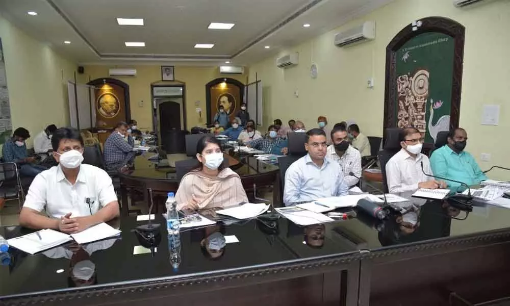 District Collector Vivek Yadav participating in a videoconference from the Collectorate in Guntur on Wednesday