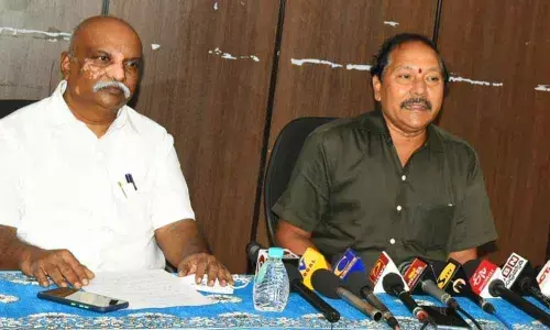 Joint Transport Commissioner S Venkateswara Rao and Deputy Transport Commissioner Ram Prasad addressing the media in Vijayawada on Wednesday