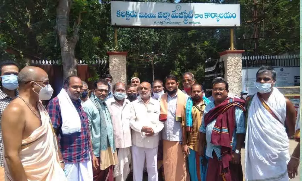 Purohits staging dharna at Collectorate in Kakinada on Thursday