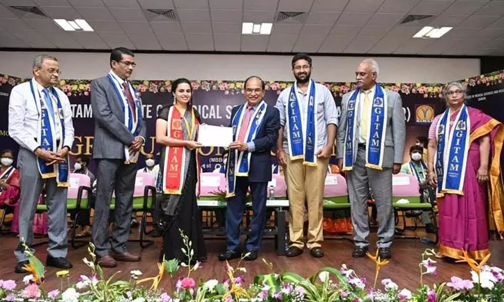 MBBS graduates of GIMSR receiving degrees at the graduation ceremony held in Visakhapatnam on Friday.