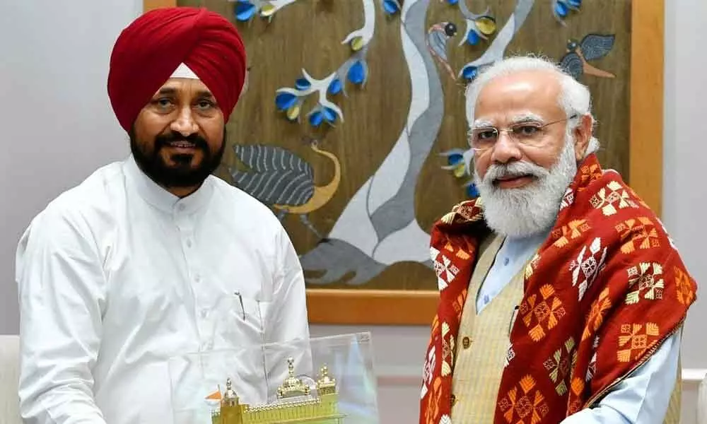 Prime Minister Narendra Modi with Punjab CM Charanjit Singh Channi during a meeting in New Delhi