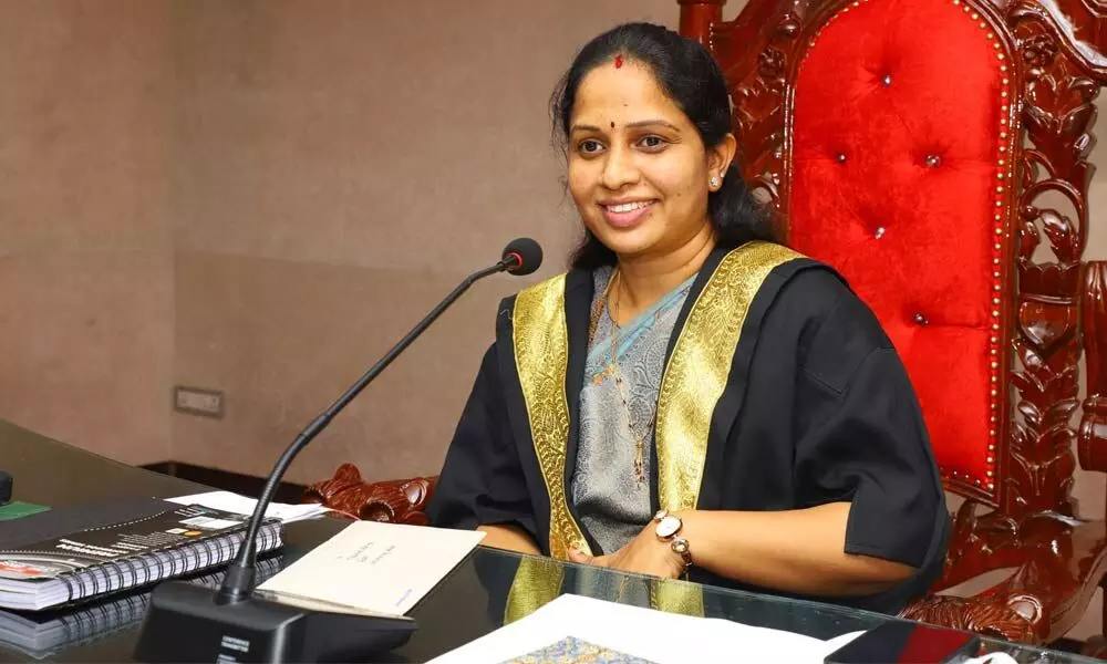 Mayor Dr Sirisha addressing the municipal council meeting in Tirupati on Friday