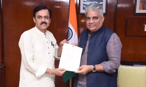 Rajya Sabha Member GVL Narasimha Rao submitting a memorandum to Union Minister for Labour and Employment Bhupender Yadav in New Delhi on Friday