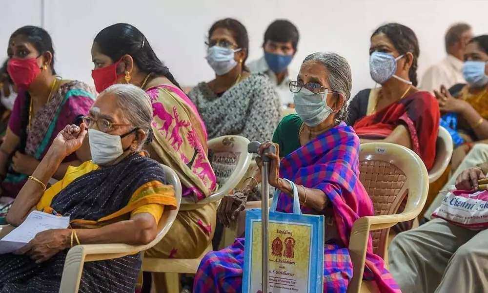 Beneficiaries wait after receiving the dose of COVID-19 vaccine at the Government Omandurar Medical College Hospital, in Chennai. (PTI)